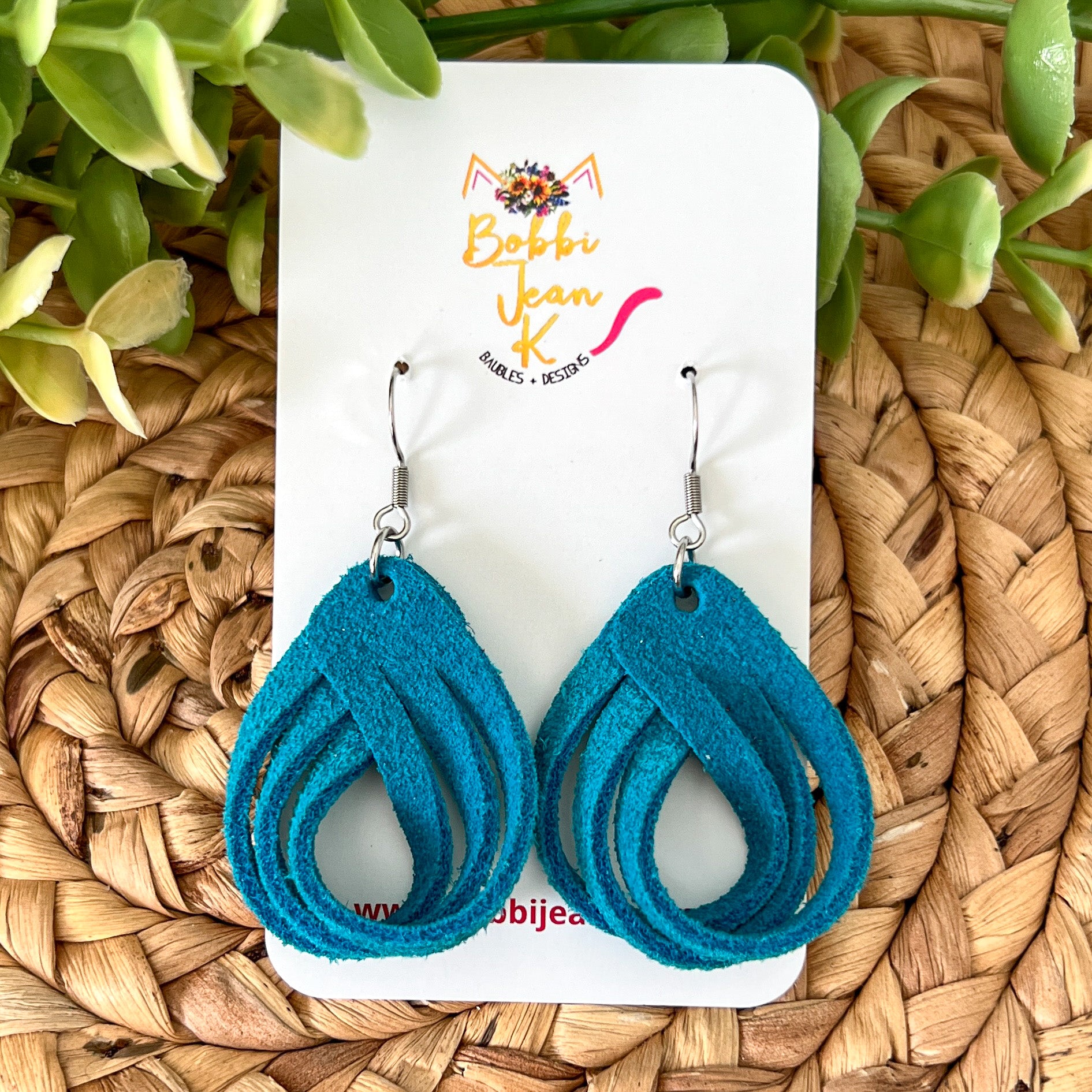 Blue leather store earrings